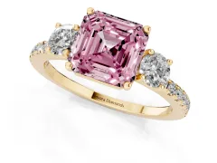 Fancy Pink Asscher Cut Diamond Three-Stone Ring Set in Yellow gold with Pavé Band and Graduated Sides