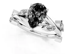 Fancy Black Pear Cut Diamond Solitaire Ring Set in Platinum with Twisted Marquise Accent Band