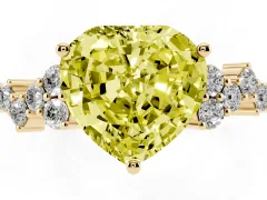 Fancy Yellow Heart Cut Diamond Ring Set in Yellow gold with Scattered Round Accents