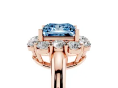 Fancy Blue Princess Cut Diamond Milgrain Halo Solitaire Ring Set in Rose gold with Bezel Set Side Stones and Pavé Band