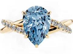 Fancy Blue Pear Cut Diamond Twisted Pavé Band Ring Set in Yellow gold with Prong Setting