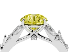 Fancy Yellow Round Cut Diamond Solitaire Ring Set in Silver with Leaf Motif Band