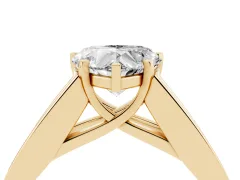 Heart Cut Diamond Solitaire Ring Set in Yellow gold with Channel-Set Accent Stones and Prong Setting