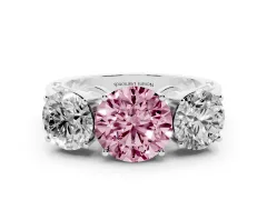 Fancy Pink Round Cut Diamond Three-Stone Ring Set in White gold with Textured Band