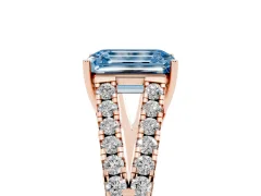 Fancy Blue Emerald Cut Diamond Split Shank Pavé Engagement Ring Set in Rose gold with Prong-Held Center Stone