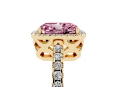Fancy Pink Radiant Cut Diamond Halo Ring Set in Yellow gold with Pavé Shoulders and Halo-Framed Center