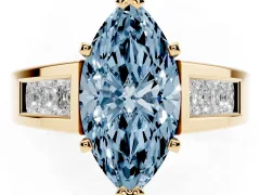 Fancy Blue Marquise Cut Diamond Solitaire Ring Set in Yellow gold with Channel-Set Accent Stones and Prong Setting