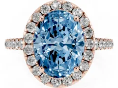 Fancy Blue Oval Cut Diamond Halo Pavé Engagement Ring Set in Rose gold with Prong Setting