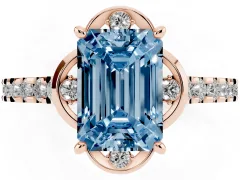 Fancy Blue Emerald Cut Diamond Solitaire Ring Set in Rose gold with Pavé Band and Floral Prong Setting