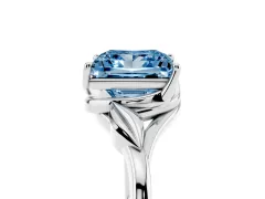 Fancy Blue Princess Cut Diamond Solitaire Ring Set in White gold with Polished Twist Band