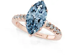 Fancy Blue Marquise Cut Diamond Solitaire Engagement Ring Set in Rose gold with Pavé Band and Prong Setting