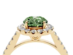 Fancy Green Oval Cut Diamond Pavé Halo Engagement Ring Set in Yellow gold with Pavé Band and Prong Setting