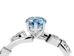 Fancy Blue Pear Cut Diamond Solitaire Ring Set in White gold with Twisted Marquise Accent Band
