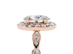 Oval Cut Diamond Halo Engagement Ring Set in Rose gold with Twisted Band and Prong Setting