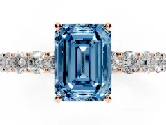 Fancy Blue Emerald Cut Diamond Solitaire Ring Set in Rose gold with Shared Prong Pavé Band