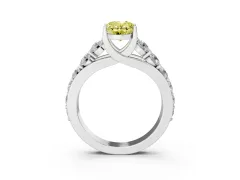Fancy Yellow Oval Cut Diamond Pavé Engagement Ring Set in White gold with Prong Setting
