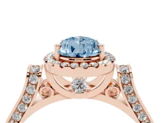 Fancy Blue Pear Cut Diamond Halo Ring Set in Rose gold with Pavé-Lined Split Shank Band