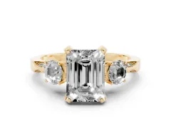 Emerald Cut Diamond Three-Stone Ring Set in Yellow gold with Pavé Band and Smaller Side Stones