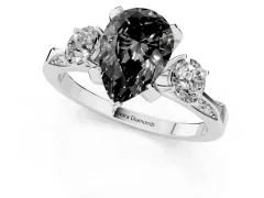 Fancy Black Pear Cut Diamond Three-Stone Ring Set in White gold with Pavé Band and Smaller Side Stones