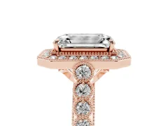 Emerald Cut Diamond Milgrain Halo Solitaire Ring Set in Rose gold with Bezel Set Side Stones and Pavé Band