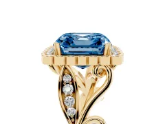 Fancy Blue Asscher Cut Diamond Halo Ring Set in Yellow gold with Leaf Motif Split Shank and Prong Setting