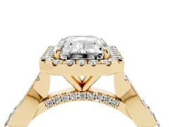 Emerald Cut Diamond Halo Twist Band Solitaire Ring Set in Yellow gold with Prong Setting