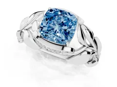 Fancy Blue Cushion Cut Diamond Leaf-Inspired Engagement Ring Set in Platinum with Round Accents