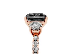 Fancy Black Asscher Cut Diamond Three-Stone Ring Set in Rose gold with Pavé Band and Graduated Sides