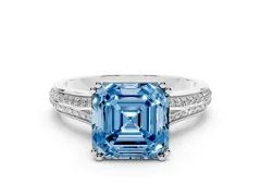 Fancy Blue Asscher Cut Diamond Split Shank Pavé Engagement Ring Set in White gold with Prong-Set Center Stone