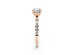 Cushion Cut Diamond Solitaire Engagement Ring Set in Rose gold with Round Pavé Band and Prong Setting