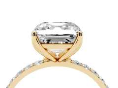 Asscher Cut Diamond Solitaire Engagement Ring Set in Yellow gold with Round Pavé Band and Prong Setting