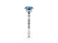 Fancy Blue Round Cut Diamond Solitaire Engagement Ring Set in White gold with Round Pavé Band and Prong Setting