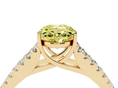 Fancy Yellow Oval Cut Diamond Split Shank Pavé Engagement Ring Set in Yellow gold with Prong-Held Center Stone