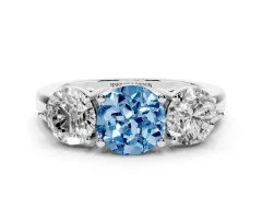 Fancy Blue Round Cut Diamond Three-Stone Ring Set in White gold with Prong Setting and Plain Band