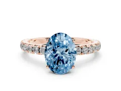 Fancy Blue Oval Cut Diamond Pavé Solitaire Engagement Ring Set in Rose gold with Prong Setting