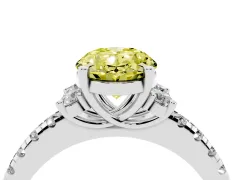Fancy Yellow Oval Cut Diamond Three-Stone Pavé Ring Set in Platinum with Prong Setting