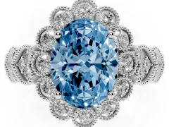 Fancy Blue Oval Cut Diamond Solitaire Ring Set in Platinum with Milgrain Pavé Heart Band