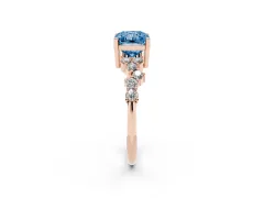 Fancy Blue Radiant Cut Diamond Ring Set in Rose gold with Scattered Round Accents