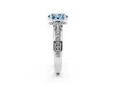 Fancy Blue Oval Cut Diamond Solitaire Ring Set in White gold with Channel Set Band and Prong Setting