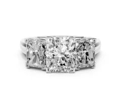 Radiant Cut Diamond Three-Stone Ring Set in White gold with Channel-Set Band and Prong Settings