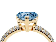 Fancy Blue Heart Cut Diamond Solitaire Ring Set in Yellow gold with Multi-Row Round Pavé Band and Prong Setting