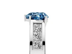 Fancy Blue Heart Cut Diamond Solitaire Ring Set in Silver with Channel-Set Accent Stones and Prong Setting