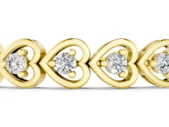 Heart Shape Diamond Tennis Bracelet Set in Yellow gold with Channel Setting and Prong-Set Stones