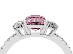 Fancy Pink Emerald Cut Diamond Three-Stone Ring Set in Platinum with Pavé Band and Graduated Sides