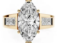 Marquise Cut Diamond Solitaire Ring Set in Yellow gold with Channel-Set Accent Stones and Prong Setting