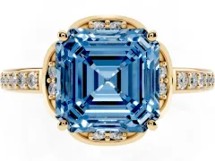 Fancy Blue Asscher Cut Diamond Halo Ring Set in Yellow gold with Channel Set Band and Prong Setting