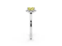 Fancy Yellow Oval Cut Diamond Halo Engagement Ring Set in White gold with Pavé Band and Rising Shoulders