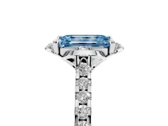 Fancy Blue Emerald Cut Diamond Solitaire Ring Set in White gold with Pavé Band and Floral Prong Setting