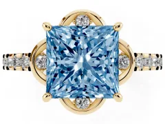 Fancy Blue Princess Cut Diamond Solitaire Ring Set in Yellow gold with Pavé Band and Floral Prong Setting