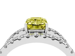 Fancy Yellow Emerald Cut Diamond Split Shank Pavé Solitaire Ring Set in White gold with Open Shank Design